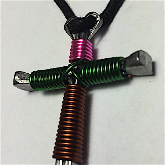 cross of nails in pink camo